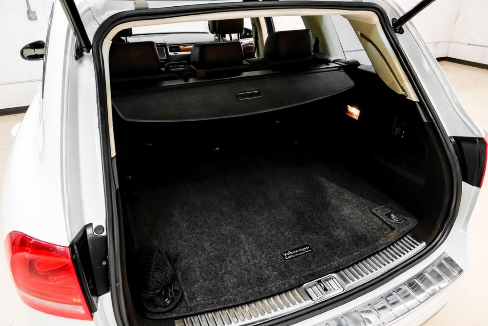 2014 Pure White /Saddle Brown Volkswagen Touareg 3.6L (WVGEF9BPXED) with an 3.6L V6 DOHC engine, Automatic transmission, located at 15300 Midway Rd., Addison, TX, 75001, (972) 702-0011, 32.958321, -96.838074- Photo#60