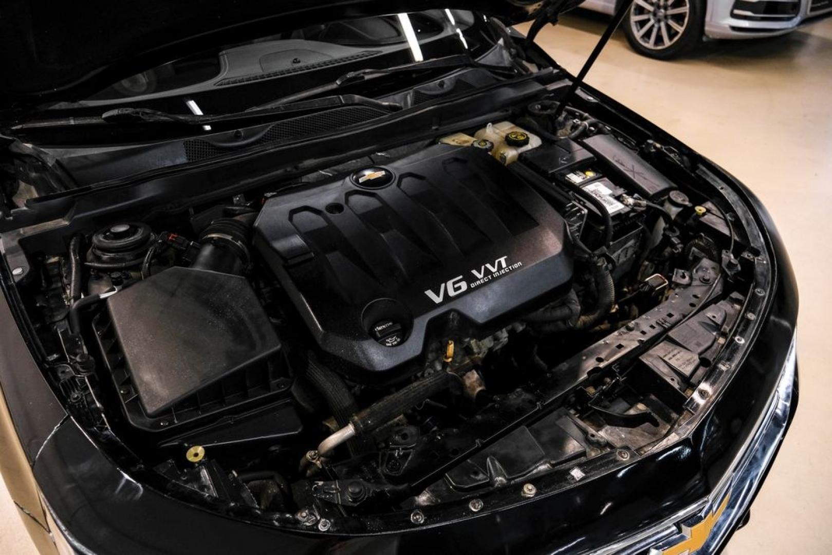 2016 Black /Jet Black/Dark Titanium Chevrolet Impala LTZ (2G1145S39G9) with an 3.6L V6 DI DOHC engine, Automatic transmission, located at 15300 Midway Rd., Addison, TX, 75001, (972) 702-0011, 32.958321, -96.838074- Photo#63