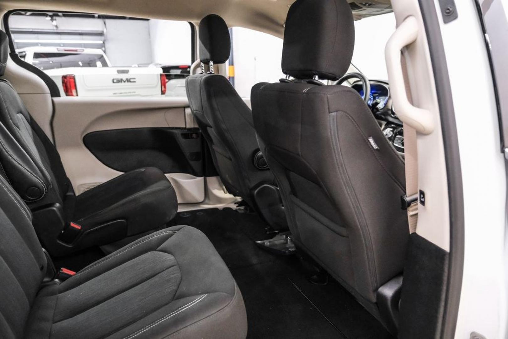 2022 Bright White Clearcoat /Black Chrysler Voyager LX (2C4RC1CG7NR) with an 3.6L V6 24V VVT engine, Automatic transmission, located at 15300 Midway Rd., Addison, TX, 75001, (972) 702-0011, 32.958321, -96.838074- Photo#35