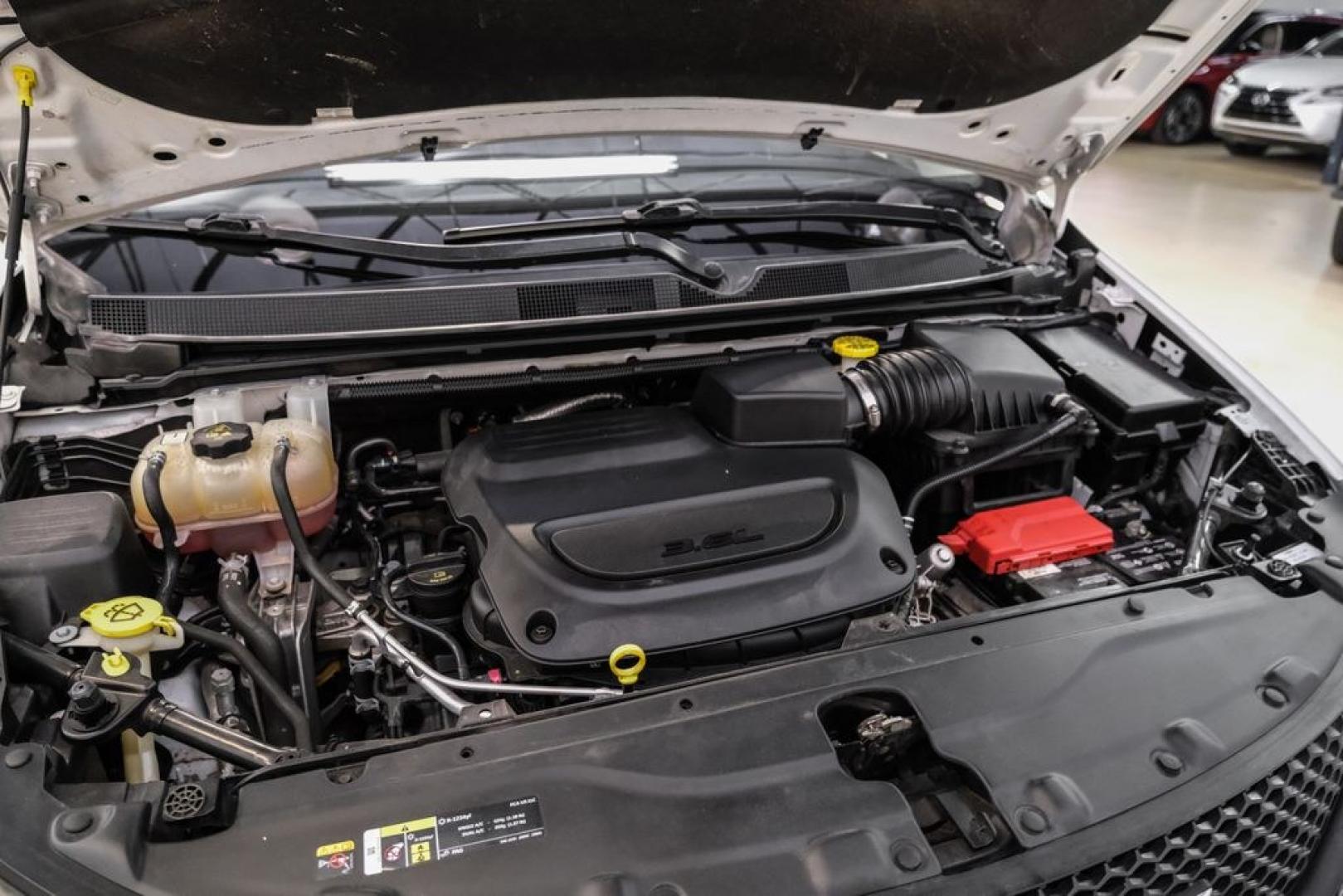 2022 Bright White Clearcoat /Black Chrysler Voyager LX (2C4RC1CG7NR) with an 3.6L V6 24V VVT engine, Automatic transmission, located at 15300 Midway Rd., Addison, TX, 75001, (972) 702-0011, 32.958321, -96.838074- Photo#46