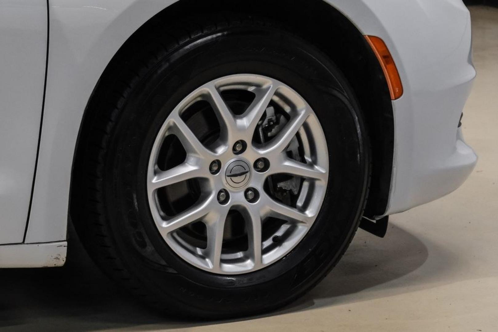 2022 Bright White Clearcoat /Black Chrysler Voyager LX (2C4RC1CG7NR) with an 3.6L V6 24V VVT engine, Automatic transmission, located at 15300 Midway Rd., Addison, TX, 75001, (972) 702-0011, 32.958321, -96.838074- Photo#53