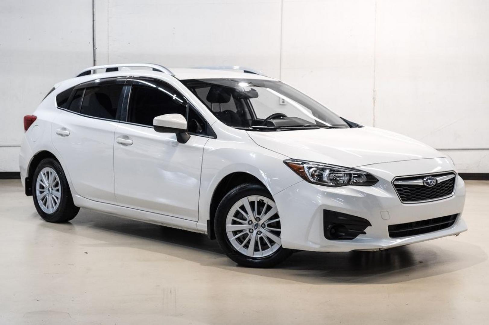 2017 Crystal White Pearl /Black Subaru Impreza 2.0i Premium (4S3GTAB69H3) with an 2.0L 4-Cylinder DOHC 16V engine, CVT transmission, located at 15300 Midway Rd., Addison, TX, 75001, (972) 702-0011, 32.958321, -96.838074- Photo#4