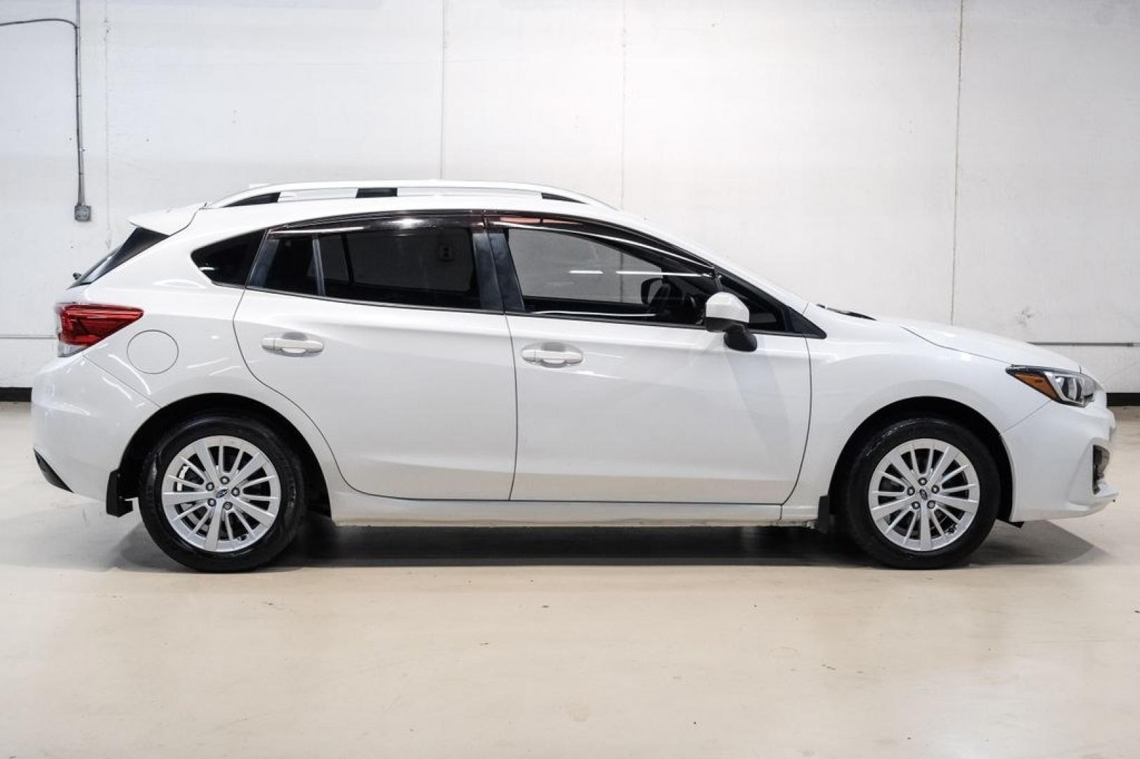 2017 Crystal White Pearl /Black Subaru Impreza 2.0i Premium (4S3GTAB69H3) with an 2.0L 4-Cylinder DOHC 16V engine, CVT transmission, located at 15300 Midway Rd., Addison, TX, 75001, (972) 702-0011, 32.958321, -96.838074- Photo#5