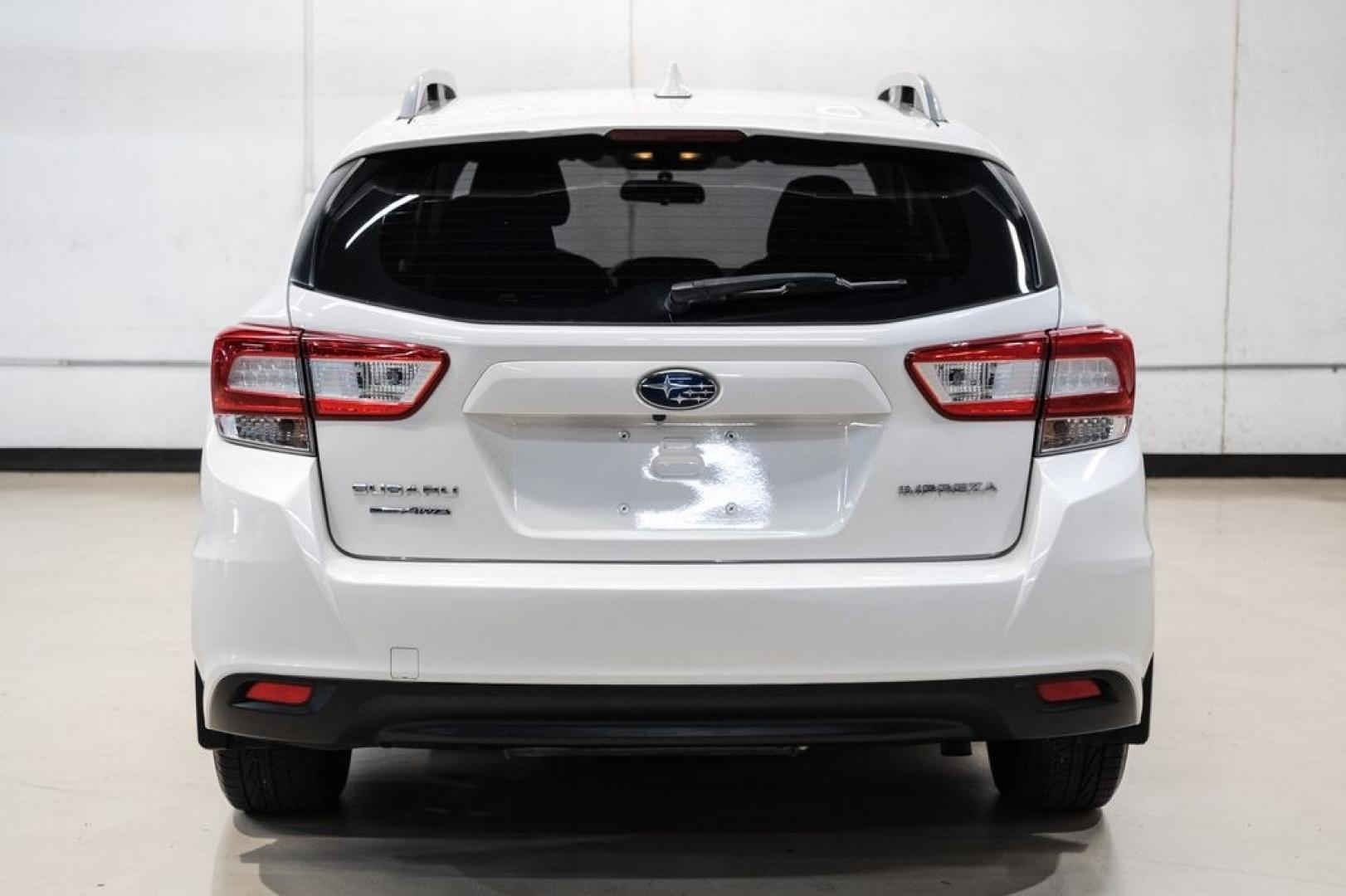 2017 Crystal White Pearl /Black Subaru Impreza 2.0i Premium (4S3GTAB69H3) with an 2.0L 4-Cylinder DOHC 16V engine, CVT transmission, located at 15300 Midway Rd., Addison, TX, 75001, (972) 702-0011, 32.958321, -96.838074- Photo#7
