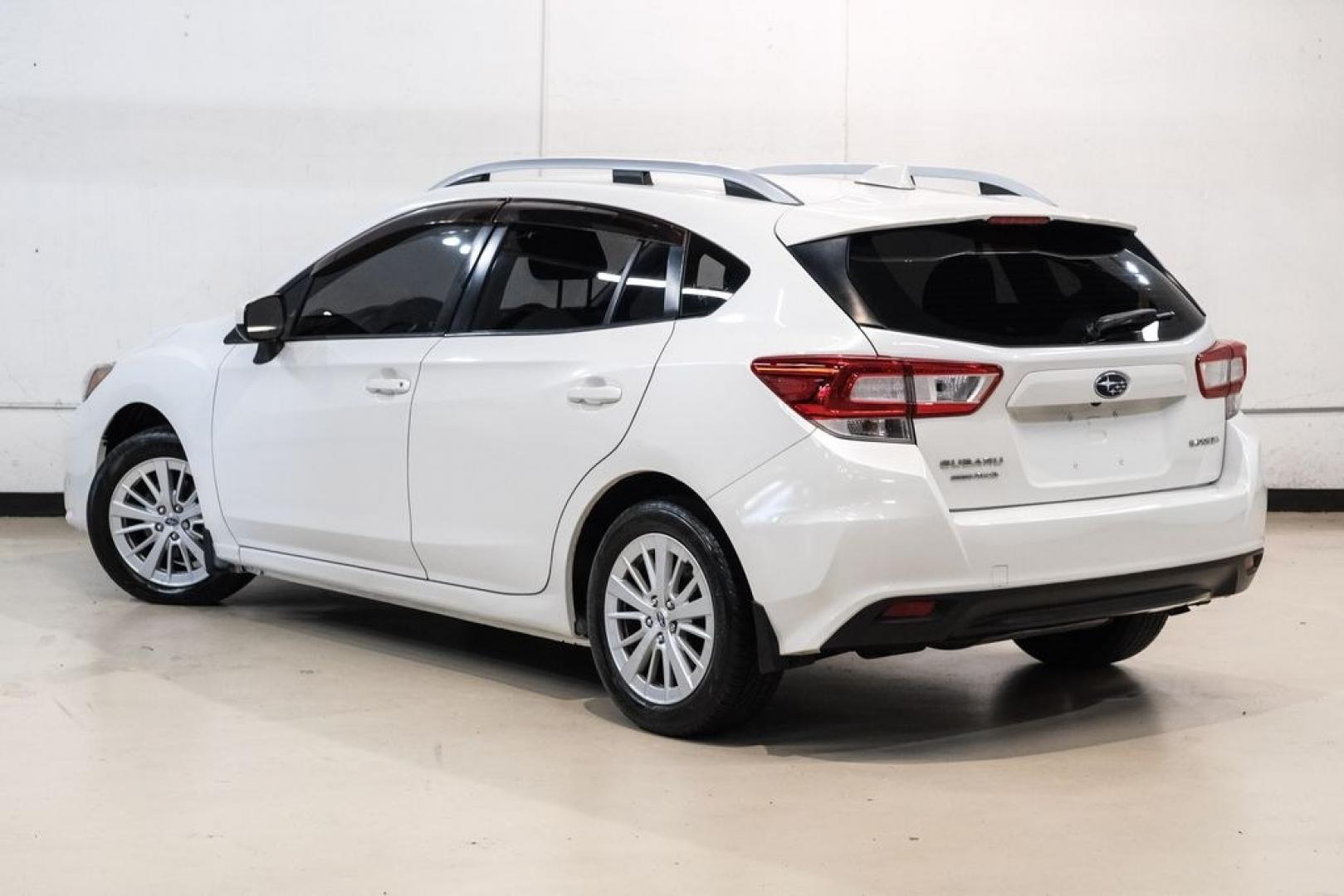 2017 Crystal White Pearl /Black Subaru Impreza 2.0i Premium (4S3GTAB69H3) with an 2.0L 4-Cylinder DOHC 16V engine, CVT transmission, located at 15300 Midway Rd., Addison, TX, 75001, (972) 702-0011, 32.958321, -96.838074- Photo#8