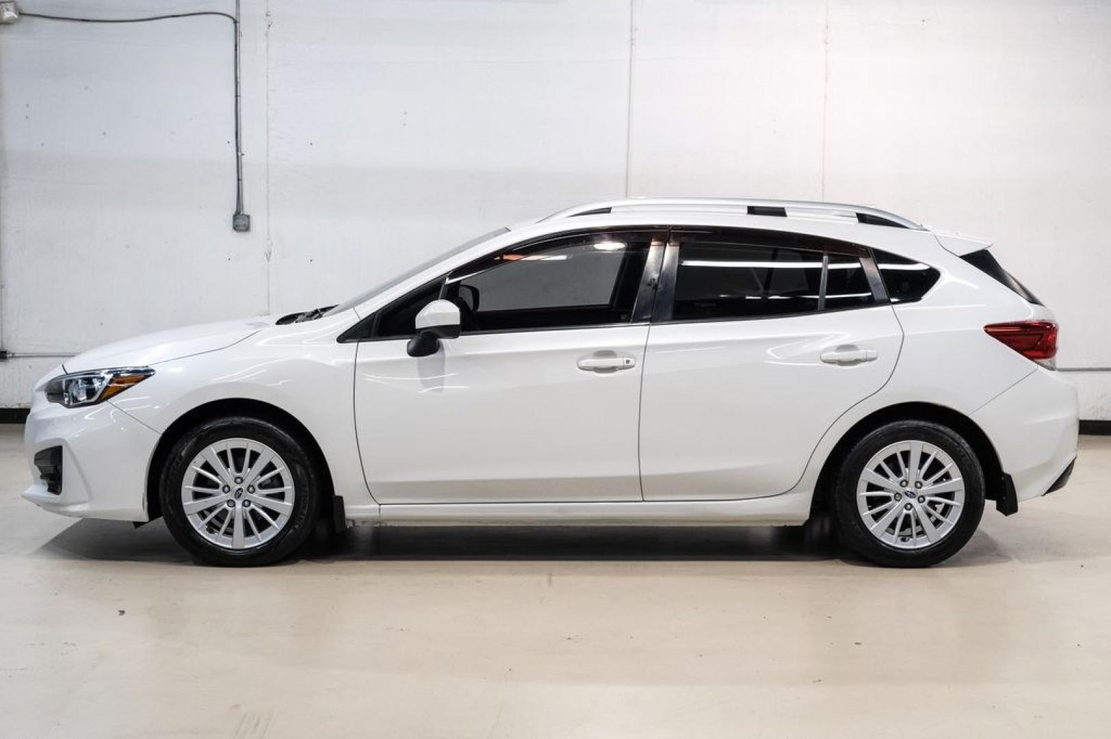 2017 Crystal White Pearl /Black Subaru Impreza 2.0i Premium (4S3GTAB69H3) with an 2.0L 4-Cylinder DOHC 16V engine, CVT transmission, located at 15300 Midway Rd., Addison, TX, 75001, (972) 702-0011, 32.958321, -96.838074- Photo#9