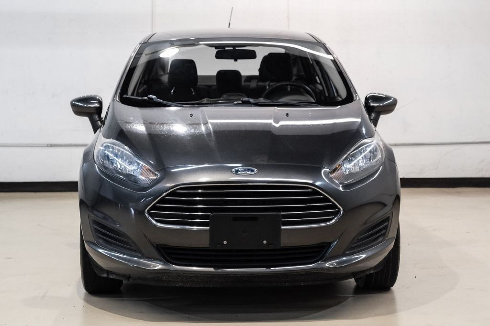 2019 Magnetic /Black Ford Fiesta SE (3FADP4BJXKM) with an 1.6L I4 Ti-VCT engine, Automatic transmission, located at 15300 Midway Rd., Addison, TX, 75001, (972) 702-0011, 32.958321, -96.838074- Photo#4