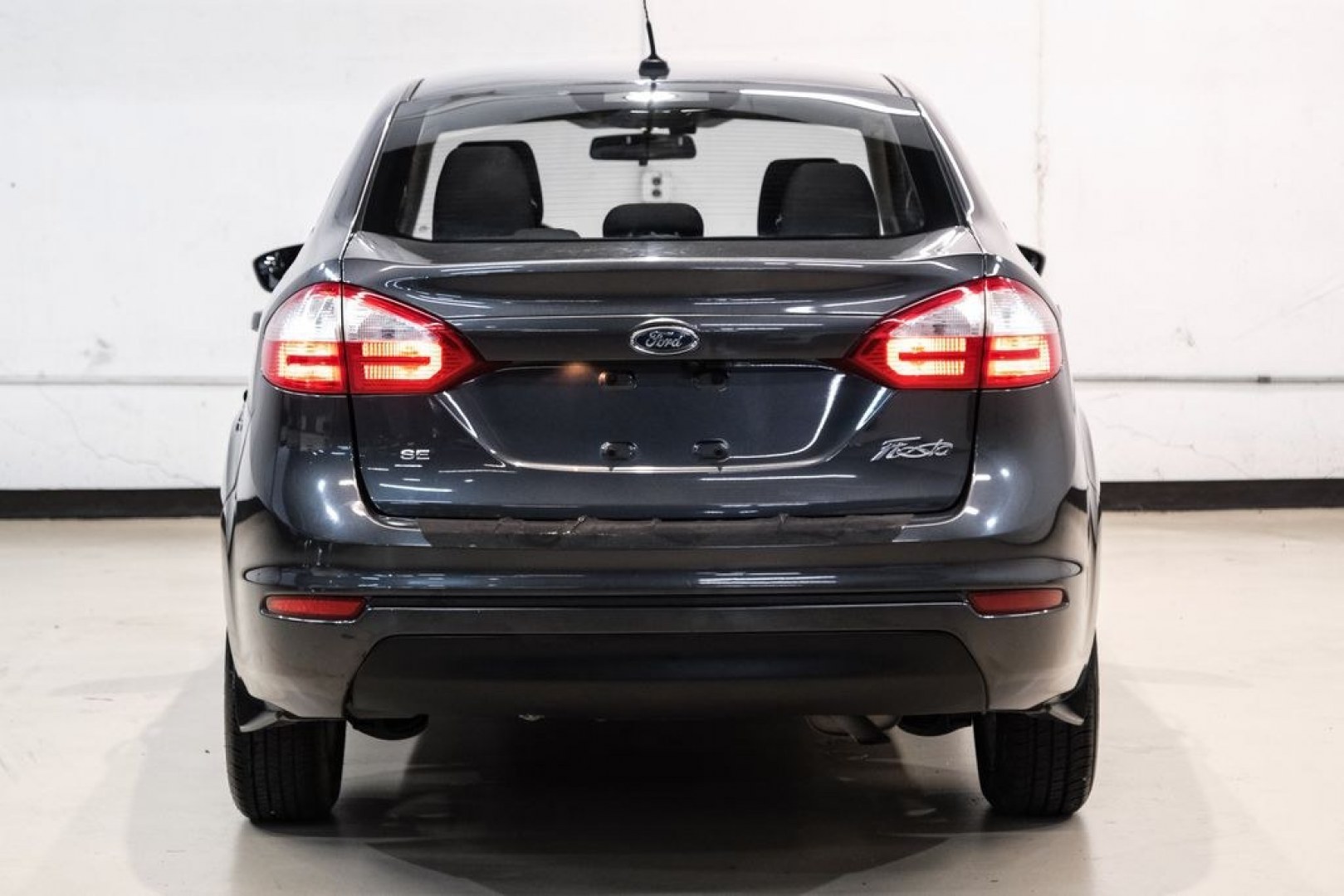 2019 Magnetic /Black Ford Fiesta SE (3FADP4BJXKM) with an 1.6L I4 Ti-VCT engine, Automatic transmission, located at 15300 Midway Rd., Addison, TX, 75001, (972) 702-0011, 32.958321, -96.838074- Photo#8