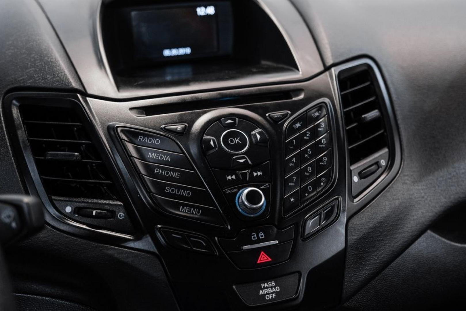2019 Magnetic /Black Ford Fiesta SE (3FADP4BJXKM) with an 1.6L I4 Ti-VCT engine, Automatic transmission, located at 15300 Midway Rd., Addison, TX, 75001, (972) 702-0011, 32.958321, -96.838074- Photo#22