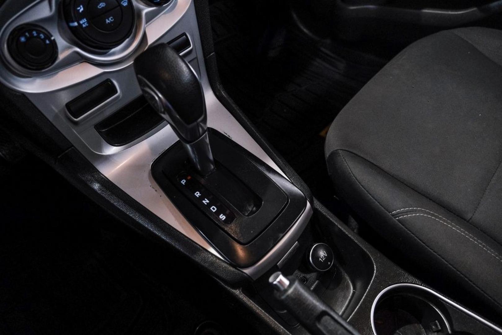 2019 Magnetic /Black Ford Fiesta SE (3FADP4BJXKM) with an 1.6L I4 Ti-VCT engine, Automatic transmission, located at 15300 Midway Rd., Addison, TX, 75001, (972) 702-0011, 32.958321, -96.838074- Photo#24