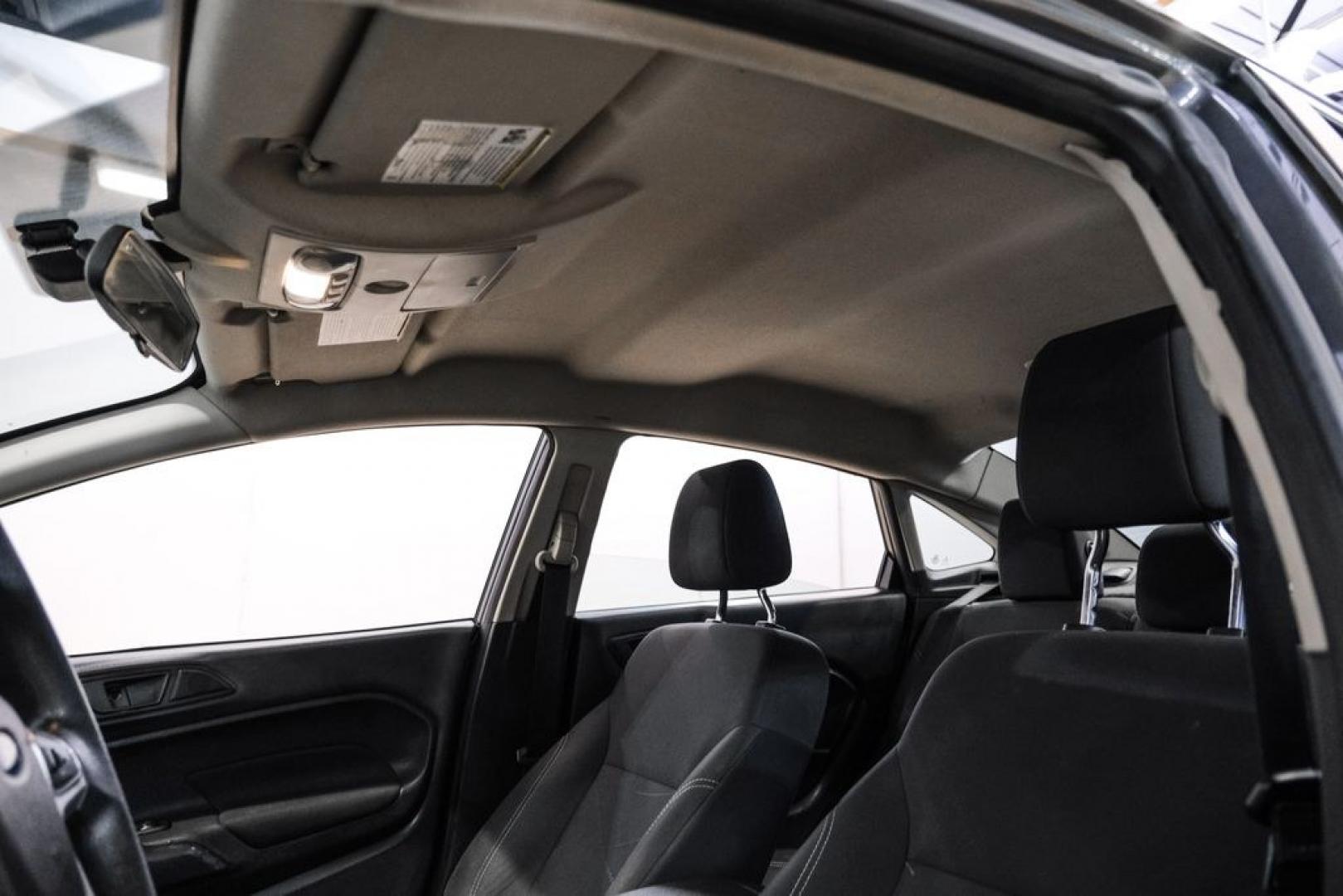 2019 Magnetic /Black Ford Fiesta SE (3FADP4BJXKM) with an 1.6L I4 Ti-VCT engine, Automatic transmission, located at 15300 Midway Rd., Addison, TX, 75001, (972) 702-0011, 32.958321, -96.838074- Photo#26