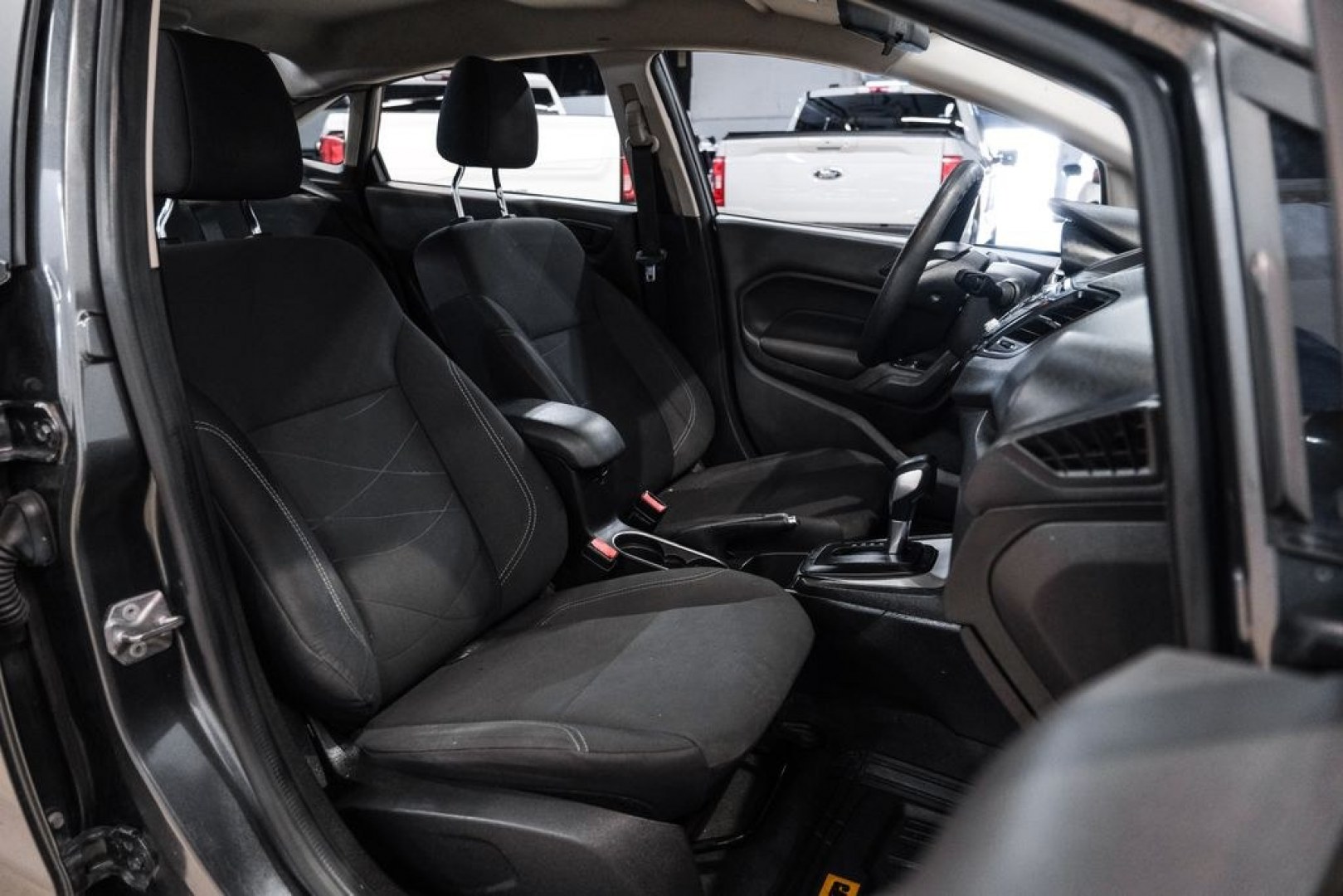 2019 Magnetic /Black Ford Fiesta SE (3FADP4BJXKM) with an 1.6L I4 Ti-VCT engine, Automatic transmission, located at 15300 Midway Rd., Addison, TX, 75001, (972) 702-0011, 32.958321, -96.838074- Photo#28