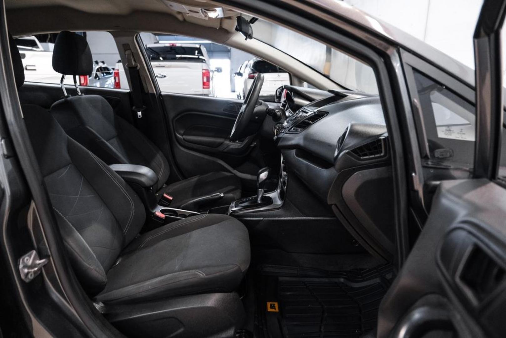 2019 Magnetic /Black Ford Fiesta SE (3FADP4BJXKM) with an 1.6L I4 Ti-VCT engine, Automatic transmission, located at 15300 Midway Rd., Addison, TX, 75001, (972) 702-0011, 32.958321, -96.838074- Photo#29