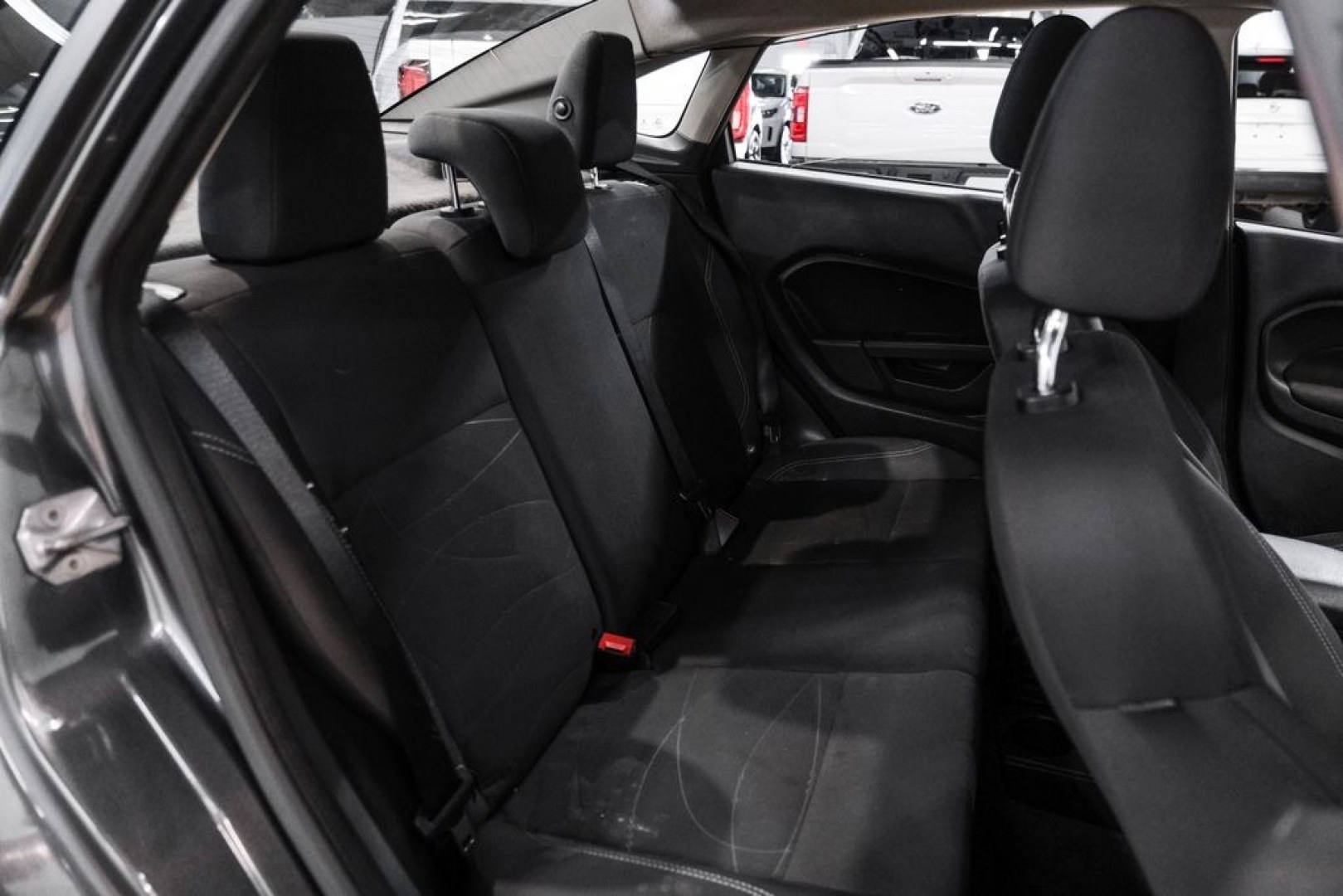 2019 Magnetic /Black Ford Fiesta SE (3FADP4BJXKM) with an 1.6L I4 Ti-VCT engine, Automatic transmission, located at 15300 Midway Rd., Addison, TX, 75001, (972) 702-0011, 32.958321, -96.838074- Photo#30