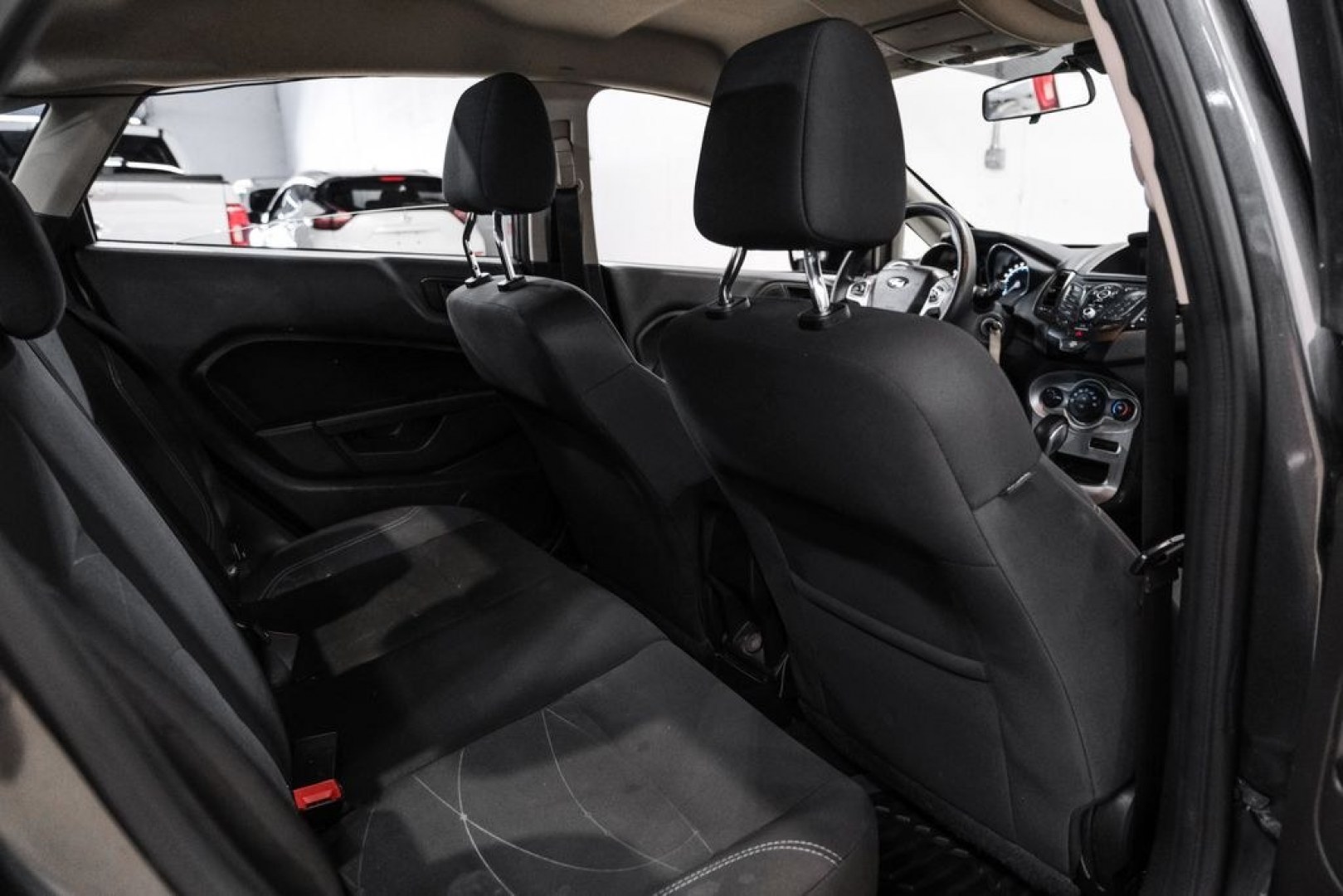 2019 Magnetic /Black Ford Fiesta SE (3FADP4BJXKM) with an 1.6L I4 Ti-VCT engine, Automatic transmission, located at 15300 Midway Rd., Addison, TX, 75001, (972) 702-0011, 32.958321, -96.838074- Photo#31