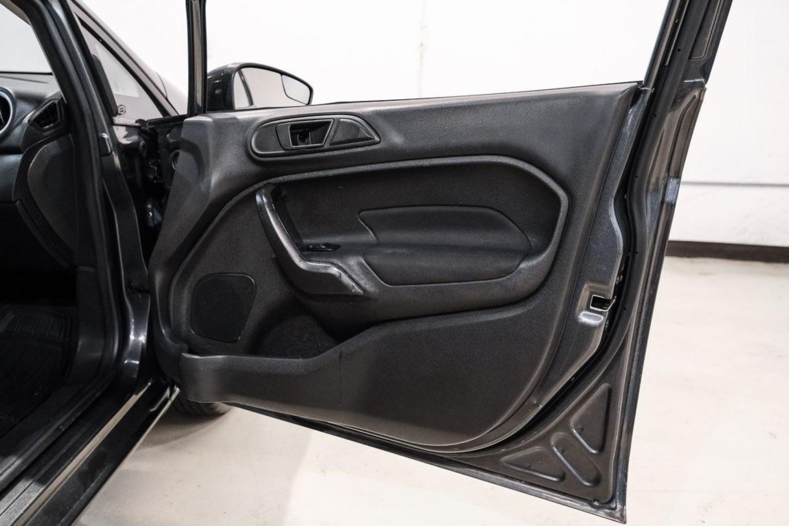 2019 Magnetic /Black Ford Fiesta SE (3FADP4BJXKM) with an 1.6L I4 Ti-VCT engine, Automatic transmission, located at 15300 Midway Rd., Addison, TX, 75001, (972) 702-0011, 32.958321, -96.838074- Photo#34