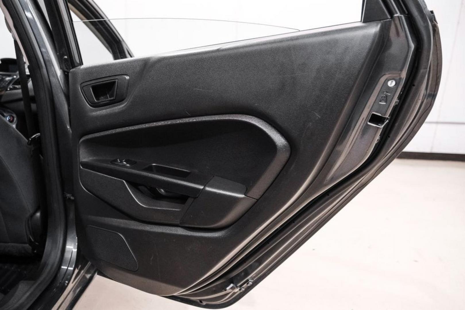 2019 Magnetic /Black Ford Fiesta SE (3FADP4BJXKM) with an 1.6L I4 Ti-VCT engine, Automatic transmission, located at 15300 Midway Rd., Addison, TX, 75001, (972) 702-0011, 32.958321, -96.838074- Photo#36