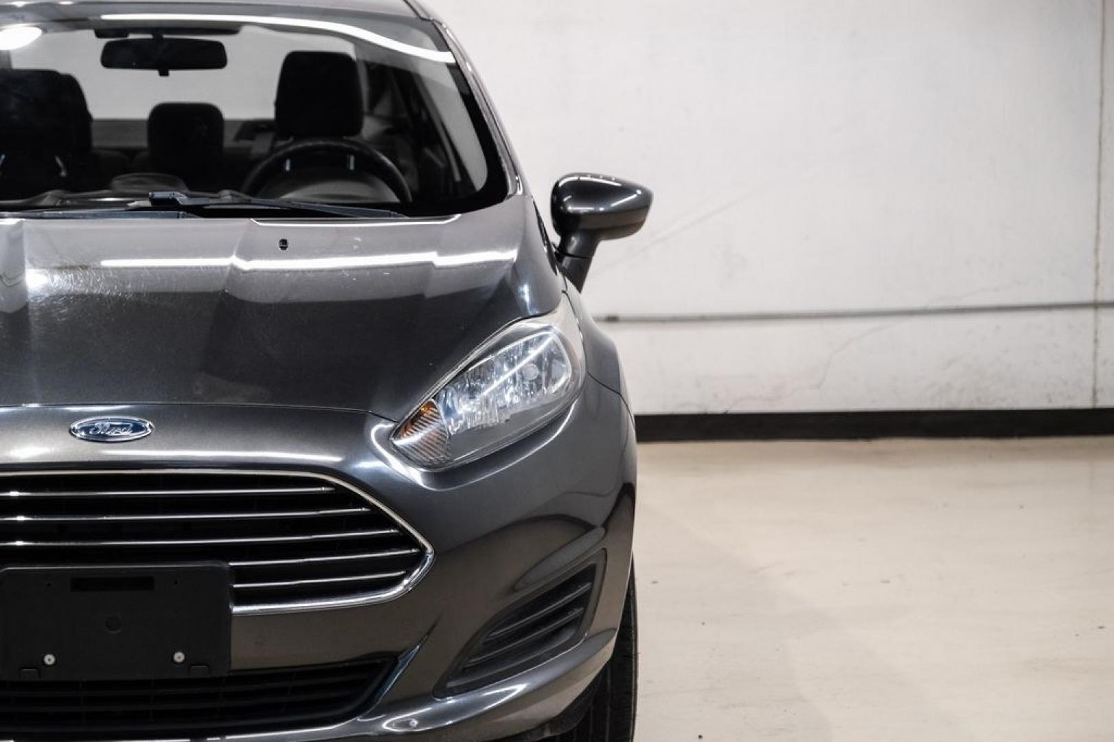 2019 Magnetic /Black Ford Fiesta SE (3FADP4BJXKM) with an 1.6L I4 Ti-VCT engine, Automatic transmission, located at 15300 Midway Rd., Addison, TX, 75001, (972) 702-0011, 32.958321, -96.838074- Photo#37