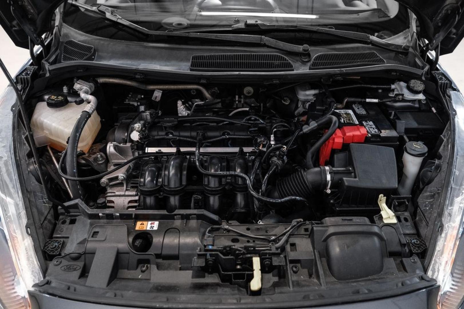 2019 Magnetic /Black Ford Fiesta SE (3FADP4BJXKM) with an 1.6L I4 Ti-VCT engine, Automatic transmission, located at 15300 Midway Rd., Addison, TX, 75001, (972) 702-0011, 32.958321, -96.838074- Photo#39