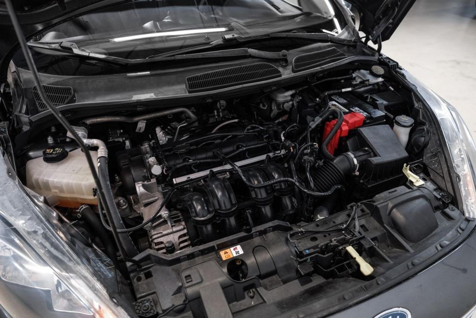 2019 Magnetic /Black Ford Fiesta SE (3FADP4BJXKM) with an 1.6L I4 Ti-VCT engine, Automatic transmission, located at 15300 Midway Rd., Addison, TX, 75001, (972) 702-0011, 32.958321, -96.838074- Photo#40