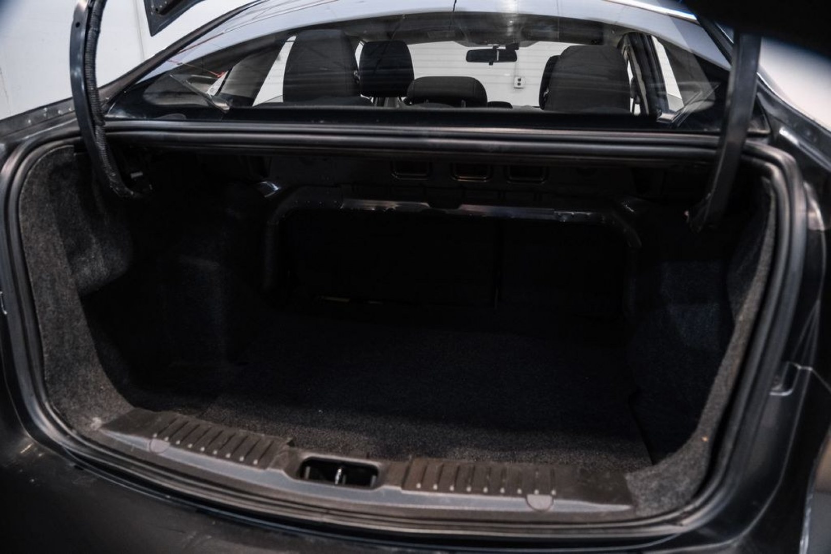 2019 Magnetic /Black Ford Fiesta SE (3FADP4BJXKM) with an 1.6L I4 Ti-VCT engine, Automatic transmission, located at 15300 Midway Rd., Addison, TX, 75001, (972) 702-0011, 32.958321, -96.838074- Photo#41