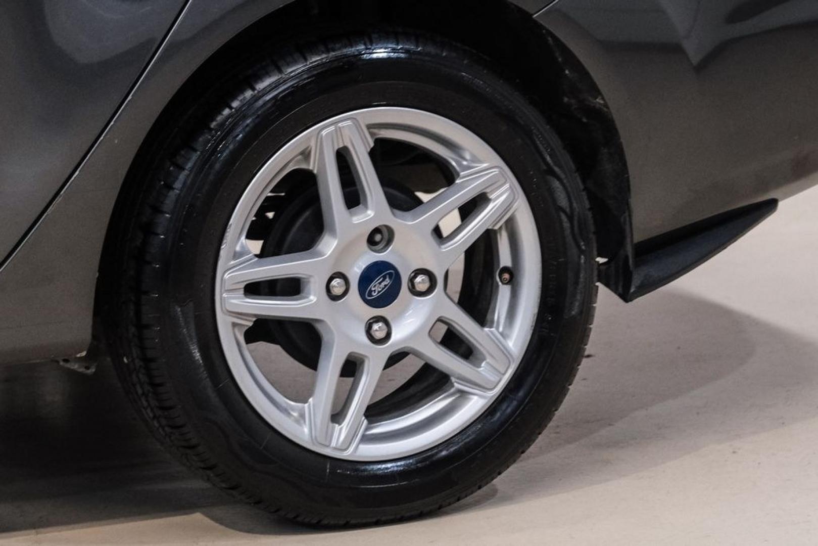 2019 Magnetic /Black Ford Fiesta SE (3FADP4BJXKM) with an 1.6L I4 Ti-VCT engine, Automatic transmission, located at 15300 Midway Rd., Addison, TX, 75001, (972) 702-0011, 32.958321, -96.838074- Photo#44