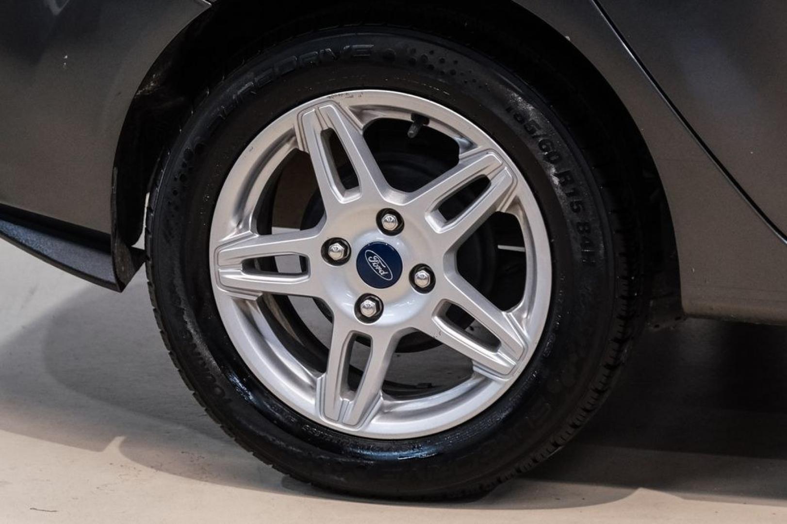 2019 Magnetic /Black Ford Fiesta SE (3FADP4BJXKM) with an 1.6L I4 Ti-VCT engine, Automatic transmission, located at 15300 Midway Rd., Addison, TX, 75001, (972) 702-0011, 32.958321, -96.838074- Photo#45