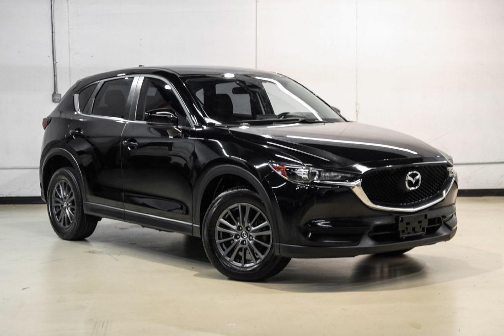 2019 Jet Black /Black Mazda CX-5 Sport (JM3KFABM1K1) with an SKYACTIV-G 2.5L 4-Cylinder DOHC 16V engine, Automatic transmission, located at 15300 Midway Rd., Addison, TX, 75001, (972) 702-0011, 32.958321, -96.838074- Photo#5