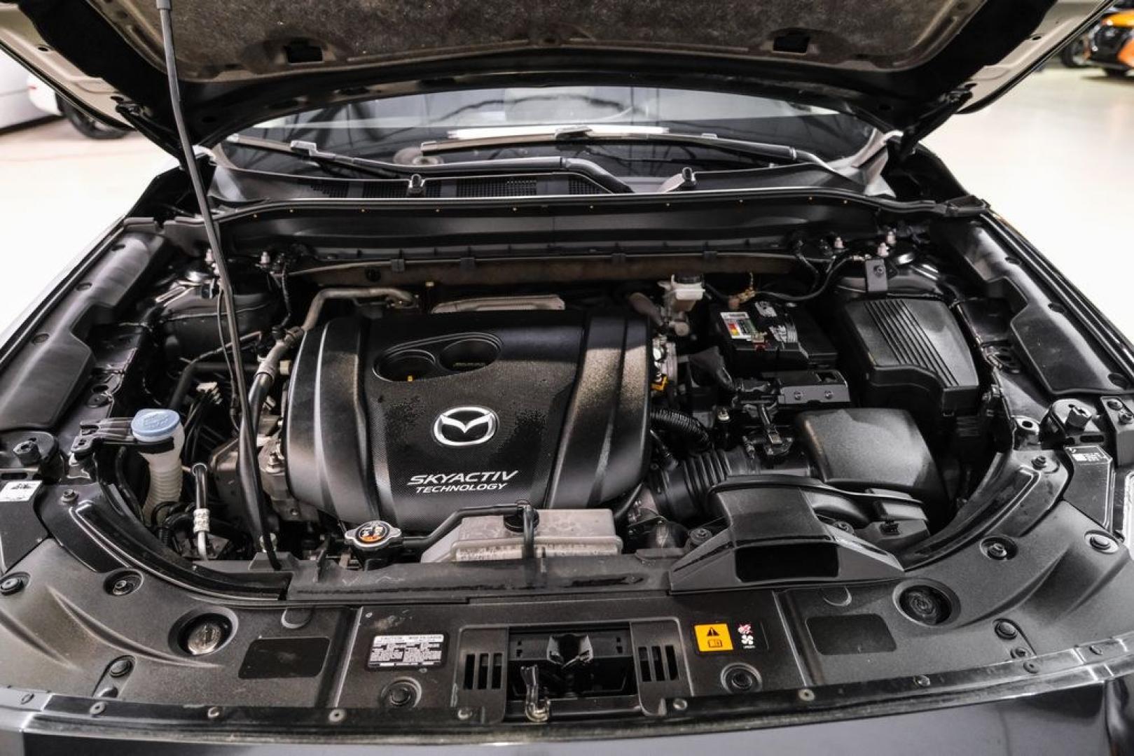 2019 Jet Black /Black Mazda CX-5 Sport (JM3KFABM1K1) with an SKYACTIV-G 2.5L 4-Cylinder DOHC 16V engine, Automatic transmission, located at 15300 Midway Rd., Addison, TX, 75001, (972) 702-0011, 32.958321, -96.838074- Photo#50