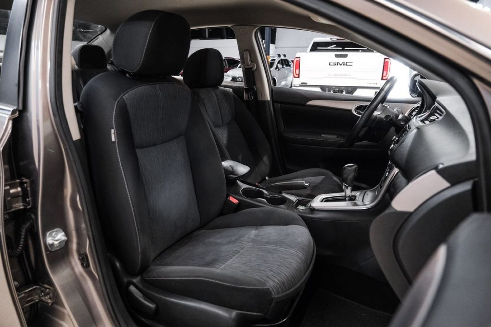 2015 Titanium /Charcoal Nissan Sentra SV (3N1AB7AP0FL) with an 1.8L 4-Cylinder DOHC 16V engine, CVT transmission, located at 15300 Midway Rd., Addison, TX, 75001, (972) 702-0011, 32.958321, -96.838074- Photo#31
