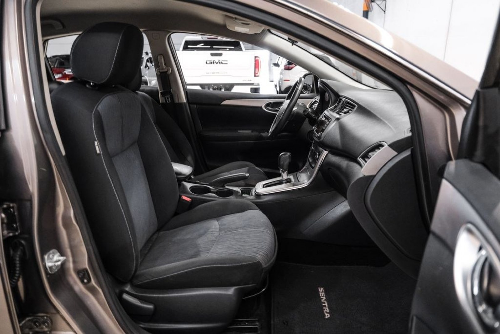 2015 Titanium /Charcoal Nissan Sentra SV (3N1AB7AP0FL) with an 1.8L 4-Cylinder DOHC 16V engine, CVT transmission, located at 15300 Midway Rd., Addison, TX, 75001, (972) 702-0011, 32.958321, -96.838074- Photo#32