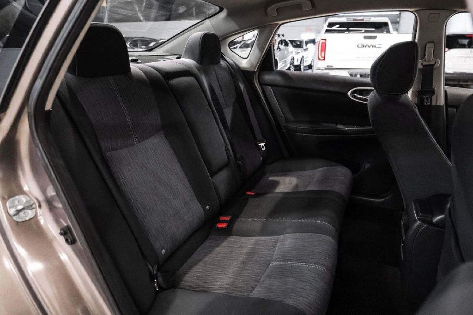 2015 Titanium /Charcoal Nissan Sentra SV (3N1AB7AP0FL) with an 1.8L 4-Cylinder DOHC 16V engine, CVT transmission, located at 15300 Midway Rd., Addison, TX, 75001, (972) 702-0011, 32.958321, -96.838074- Photo#33
