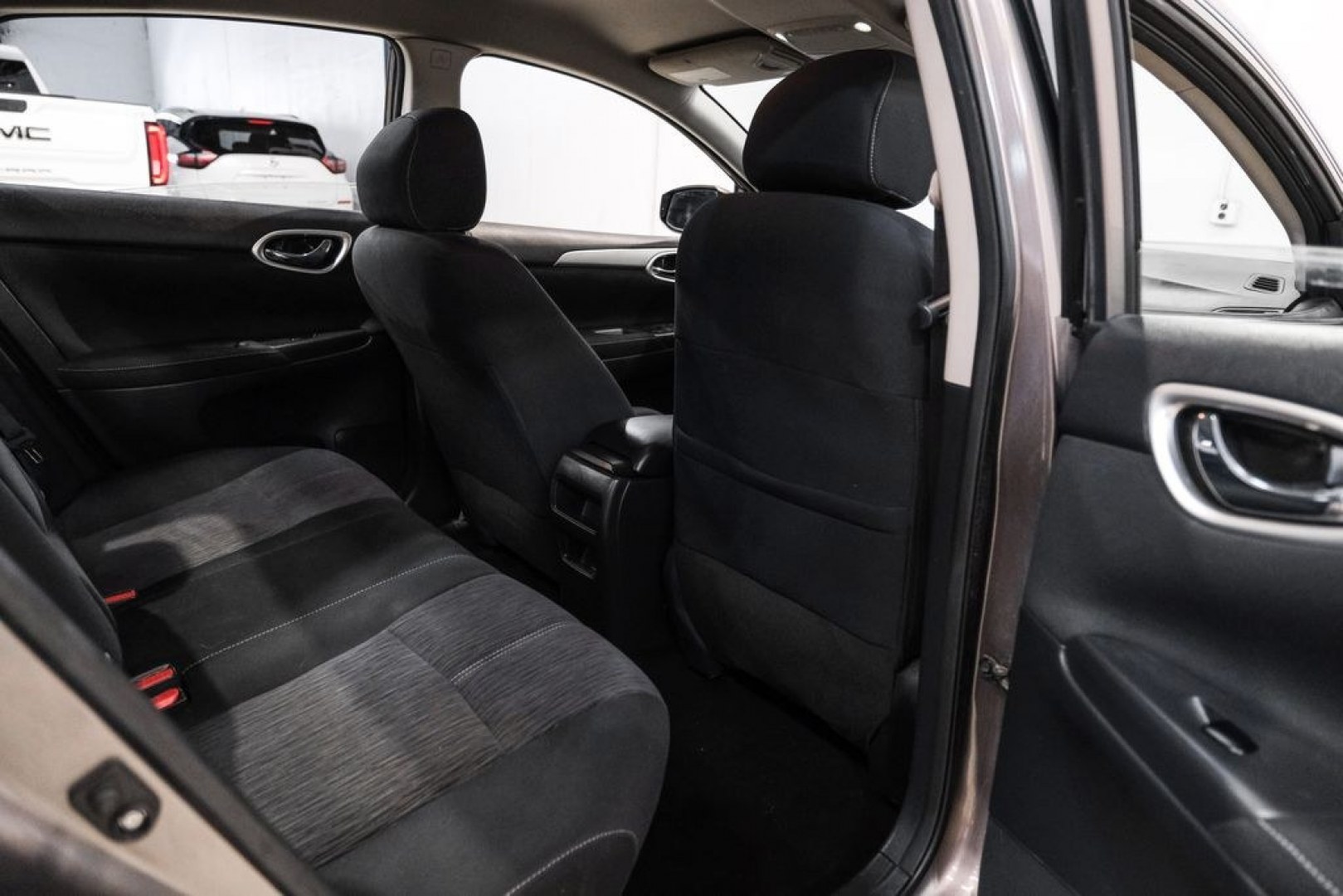 2015 Titanium /Charcoal Nissan Sentra SV (3N1AB7AP0FL) with an 1.8L 4-Cylinder DOHC 16V engine, CVT transmission, located at 15300 Midway Rd., Addison, TX, 75001, (972) 702-0011, 32.958321, -96.838074- Photo#34