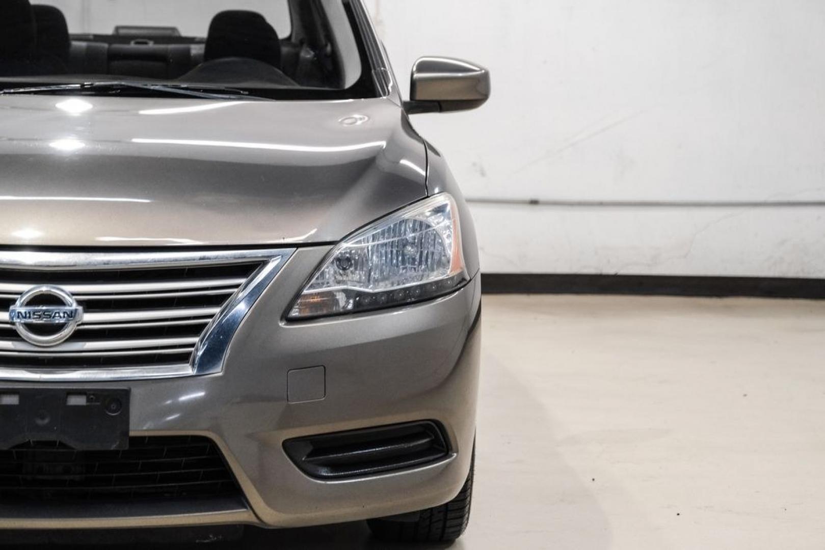 2015 Titanium /Charcoal Nissan Sentra SV (3N1AB7AP0FL) with an 1.8L 4-Cylinder DOHC 16V engine, CVT transmission, located at 15300 Midway Rd., Addison, TX, 75001, (972) 702-0011, 32.958321, -96.838074- Photo#44