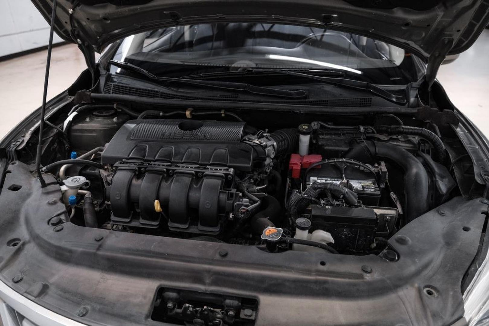 2015 Titanium /Charcoal Nissan Sentra SV (3N1AB7AP0FL) with an 1.8L 4-Cylinder DOHC 16V engine, CVT transmission, located at 15300 Midway Rd., Addison, TX, 75001, (972) 702-0011, 32.958321, -96.838074- Photo#46