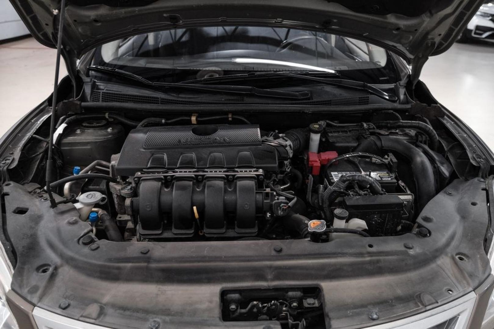 2015 Titanium /Charcoal Nissan Sentra SV (3N1AB7AP0FL) with an 1.8L 4-Cylinder DOHC 16V engine, CVT transmission, located at 15300 Midway Rd., Addison, TX, 75001, (972) 702-0011, 32.958321, -96.838074- Photo#47