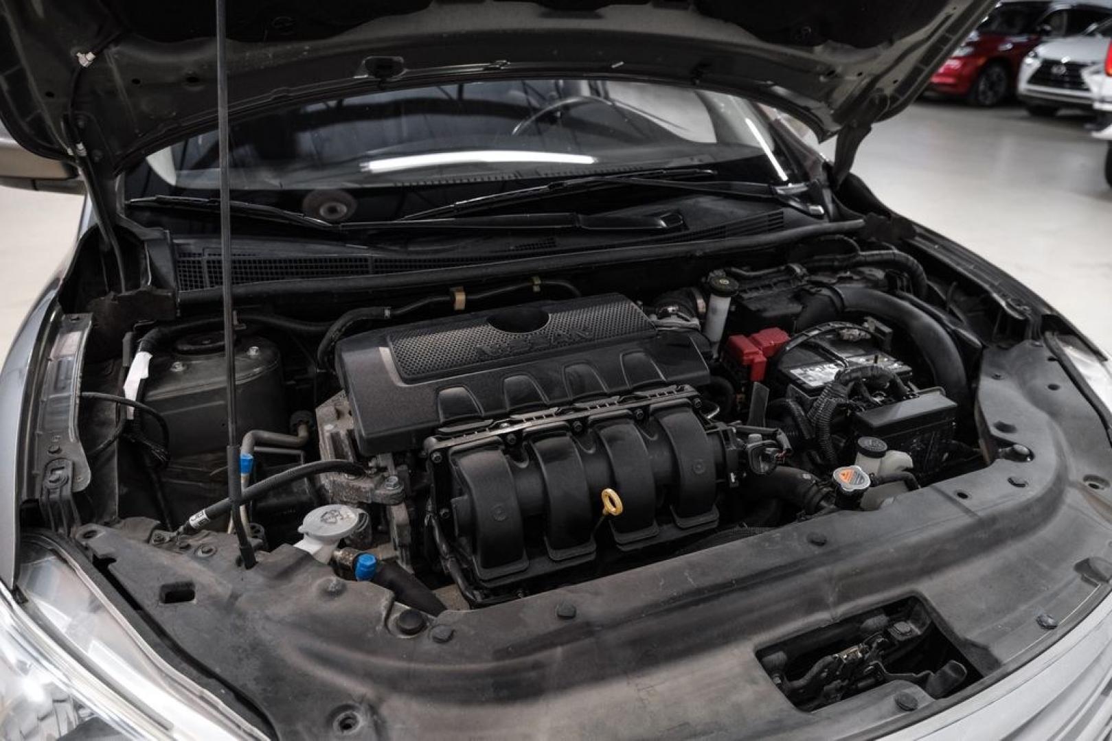 2015 Titanium /Charcoal Nissan Sentra SV (3N1AB7AP0FL) with an 1.8L 4-Cylinder DOHC 16V engine, CVT transmission, located at 15300 Midway Rd., Addison, TX, 75001, (972) 702-0011, 32.958321, -96.838074- Photo#48