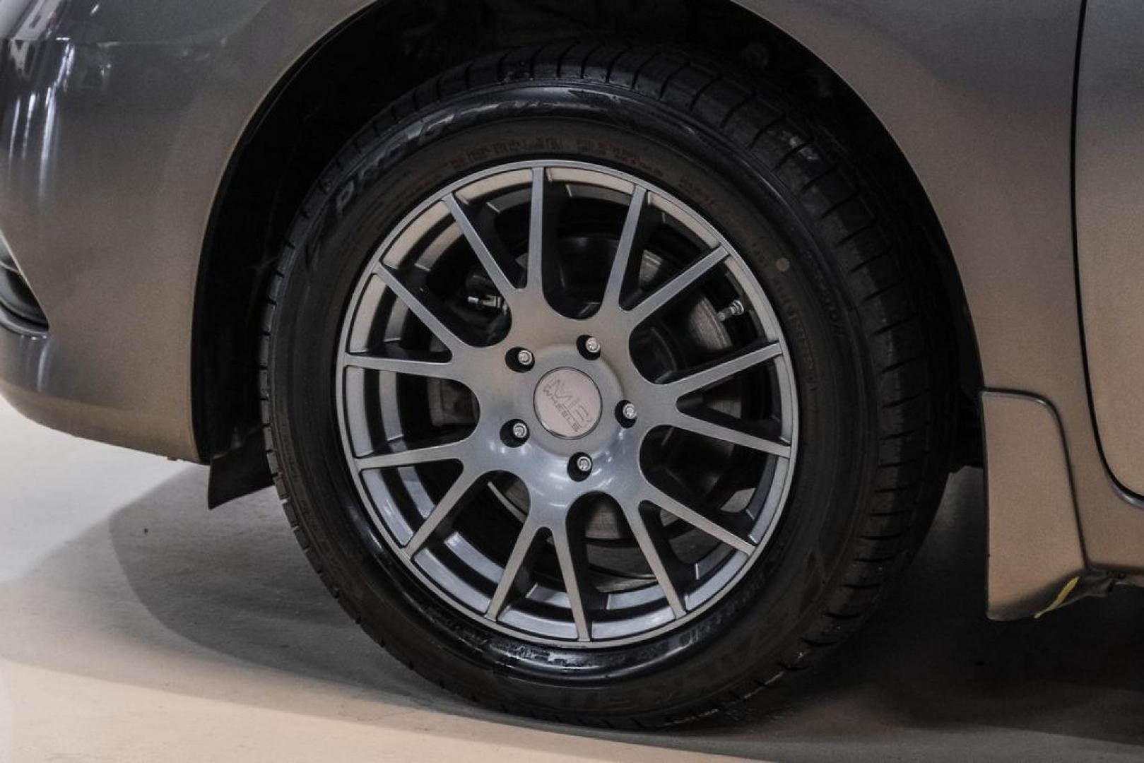 2015 Titanium /Charcoal Nissan Sentra SV (3N1AB7AP0FL) with an 1.8L 4-Cylinder DOHC 16V engine, CVT transmission, located at 15300 Midway Rd., Addison, TX, 75001, (972) 702-0011, 32.958321, -96.838074- Photo#51