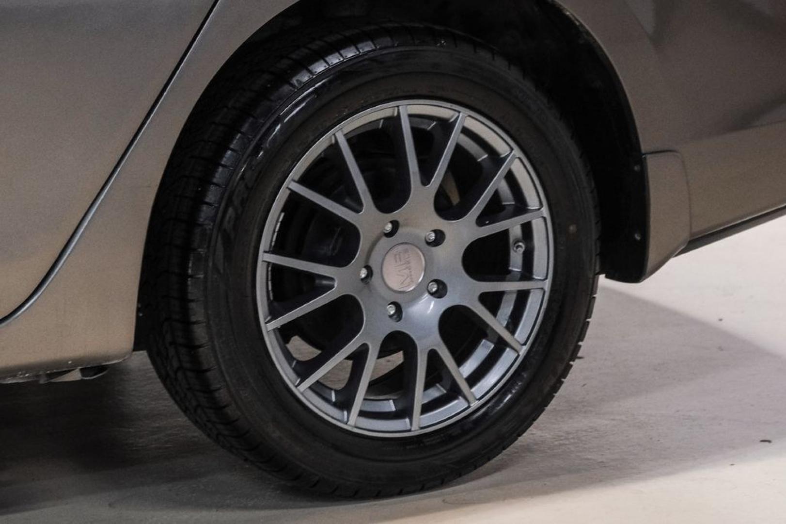 2015 Titanium /Charcoal Nissan Sentra SV (3N1AB7AP0FL) with an 1.8L 4-Cylinder DOHC 16V engine, CVT transmission, located at 15300 Midway Rd., Addison, TX, 75001, (972) 702-0011, 32.958321, -96.838074- Photo#52