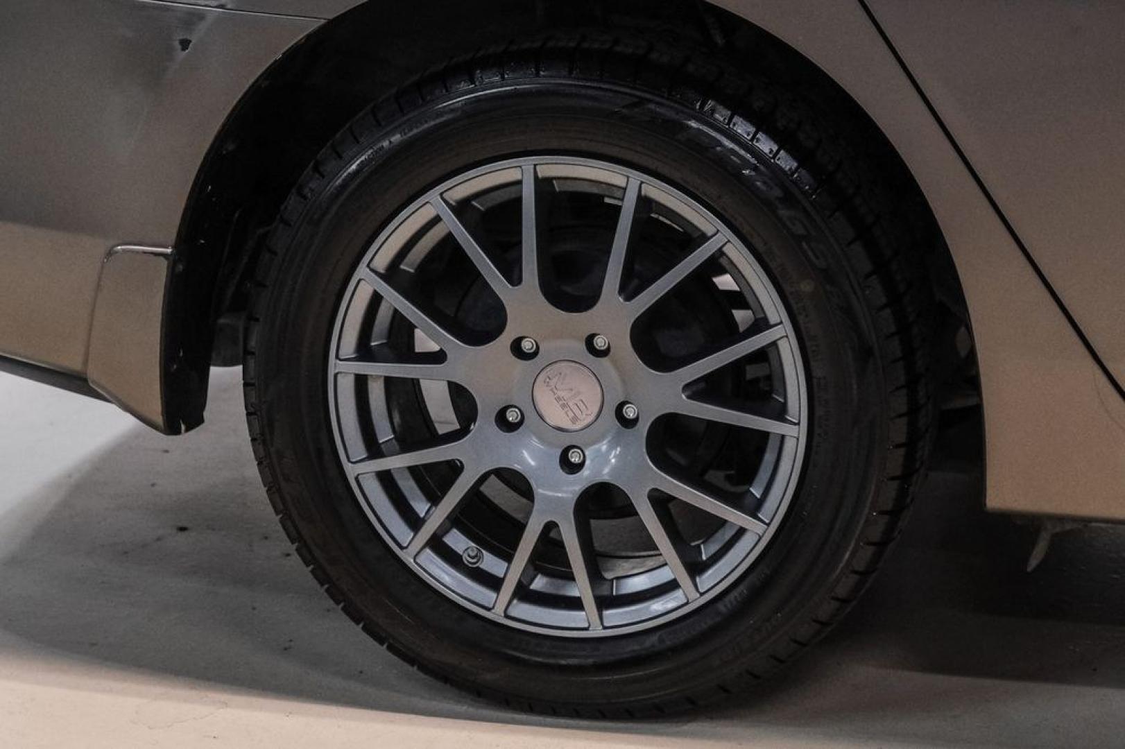 2015 Titanium /Charcoal Nissan Sentra SV (3N1AB7AP0FL) with an 1.8L 4-Cylinder DOHC 16V engine, CVT transmission, located at 15300 Midway Rd., Addison, TX, 75001, (972) 702-0011, 32.958321, -96.838074- Photo#53