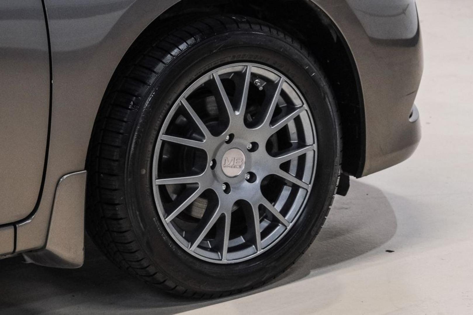 2015 Titanium /Charcoal Nissan Sentra SV (3N1AB7AP0FL) with an 1.8L 4-Cylinder DOHC 16V engine, CVT transmission, located at 15300 Midway Rd., Addison, TX, 75001, (972) 702-0011, 32.958321, -96.838074- Photo#54