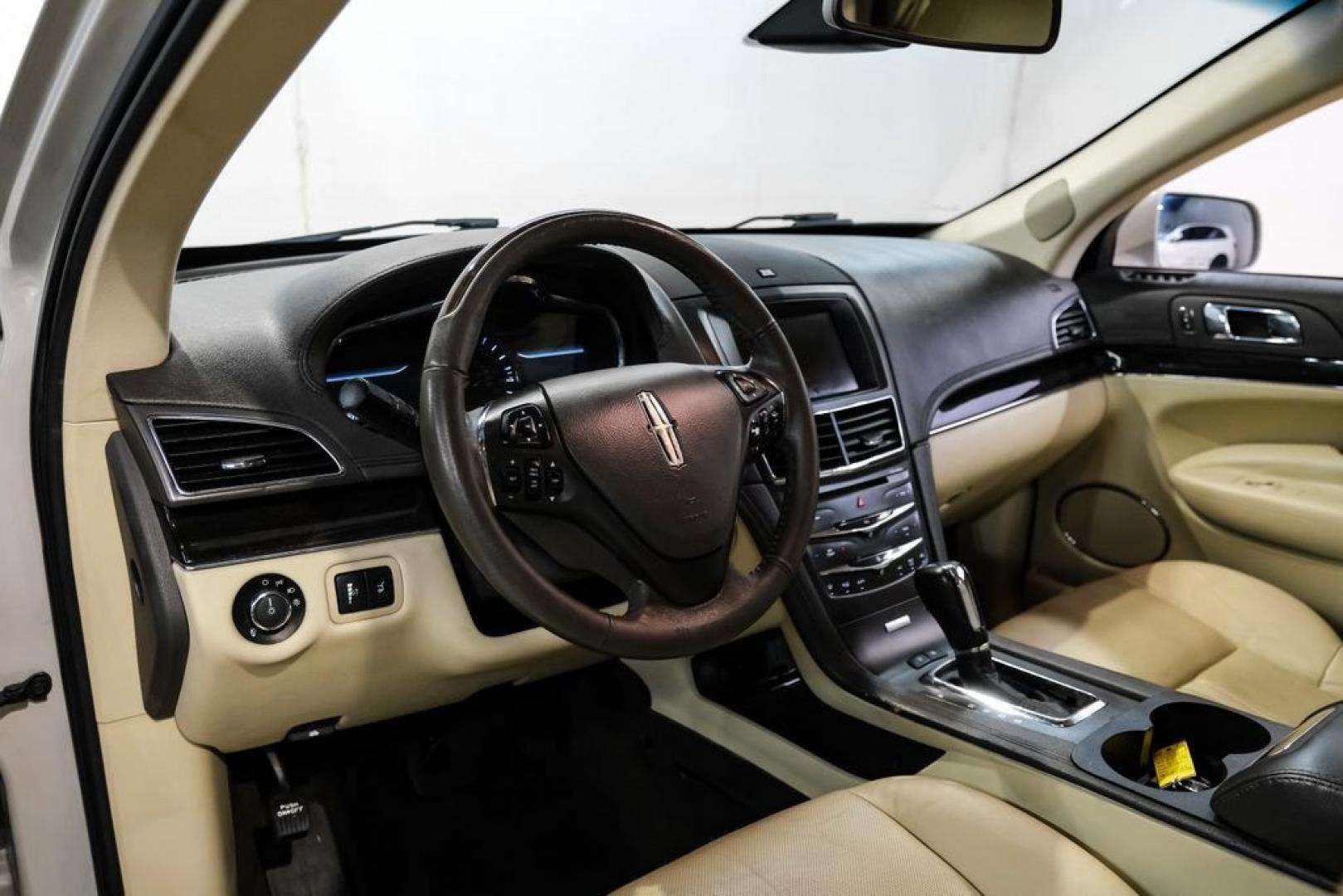 2019 Pearl Metallic /Light Dune Lincoln MKT Standard (2LMHJ5AT2KB) with an V6 engine, Automatic transmission, located at 15300 Midway Rd., Addison, TX, 75001, (972) 702-0011, 32.958321, -96.838074- Photo#2