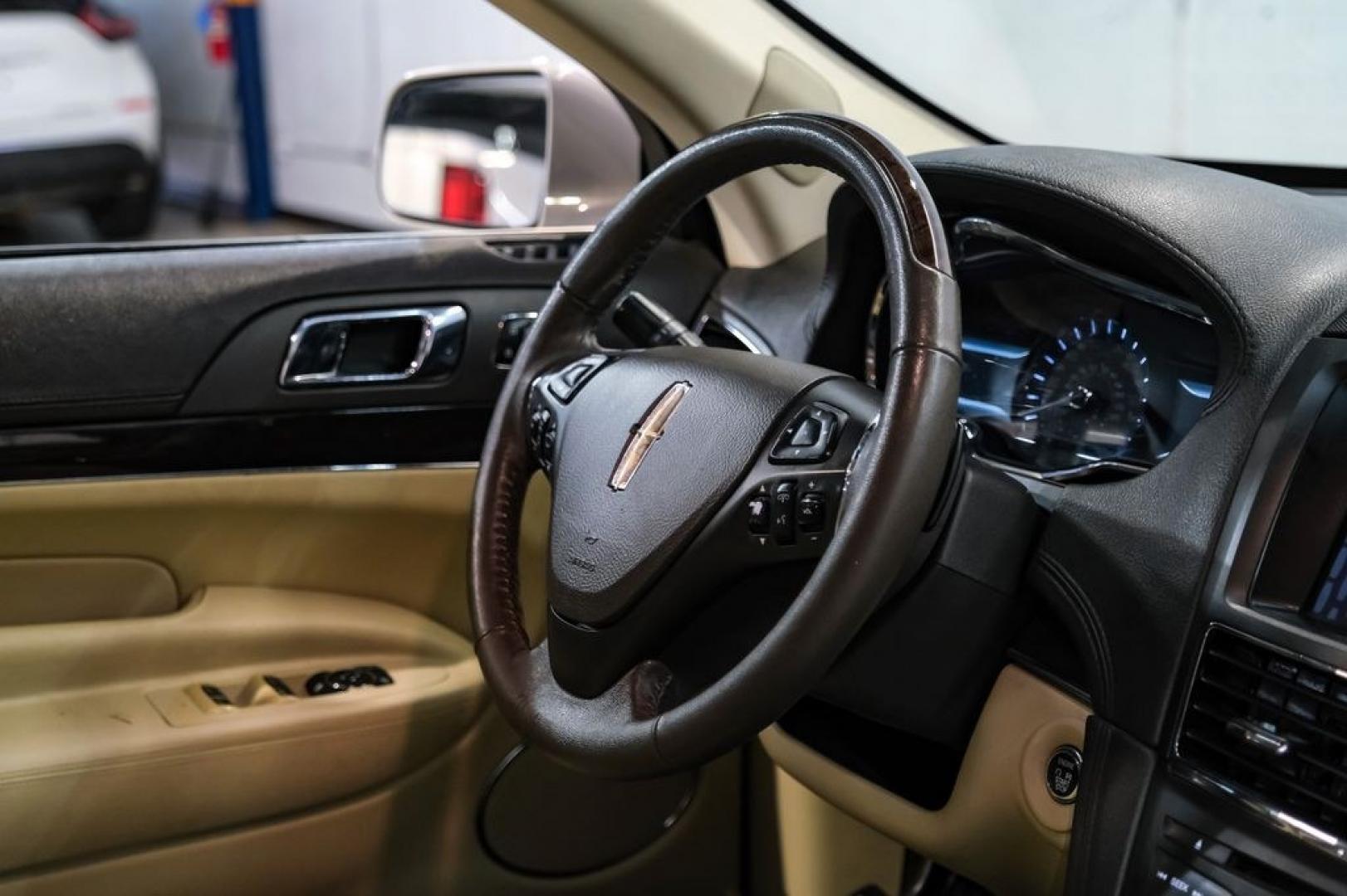 2019 Pearl Metallic /Light Dune Lincoln MKT Standard (2LMHJ5AT2KB) with an V6 engine, Automatic transmission, located at 15300 Midway Rd., Addison, TX, 75001, (972) 702-0011, 32.958321, -96.838074- Photo#12