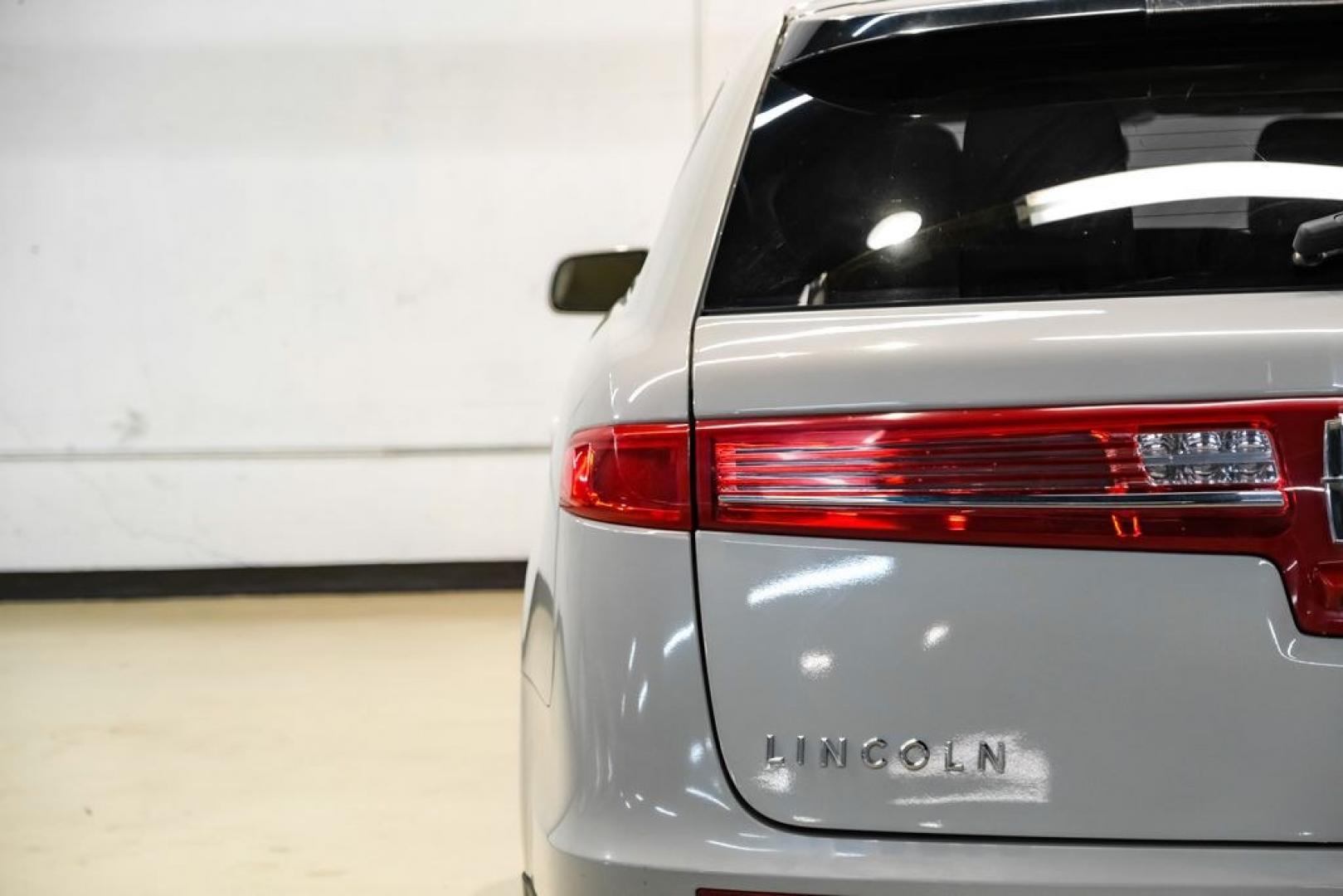 2019 Pearl Metallic /Light Dune Lincoln MKT Standard (2LMHJ5AT2KB) with an V6 engine, Automatic transmission, located at 15300 Midway Rd., Addison, TX, 75001, (972) 702-0011, 32.958321, -96.838074- Photo#49
