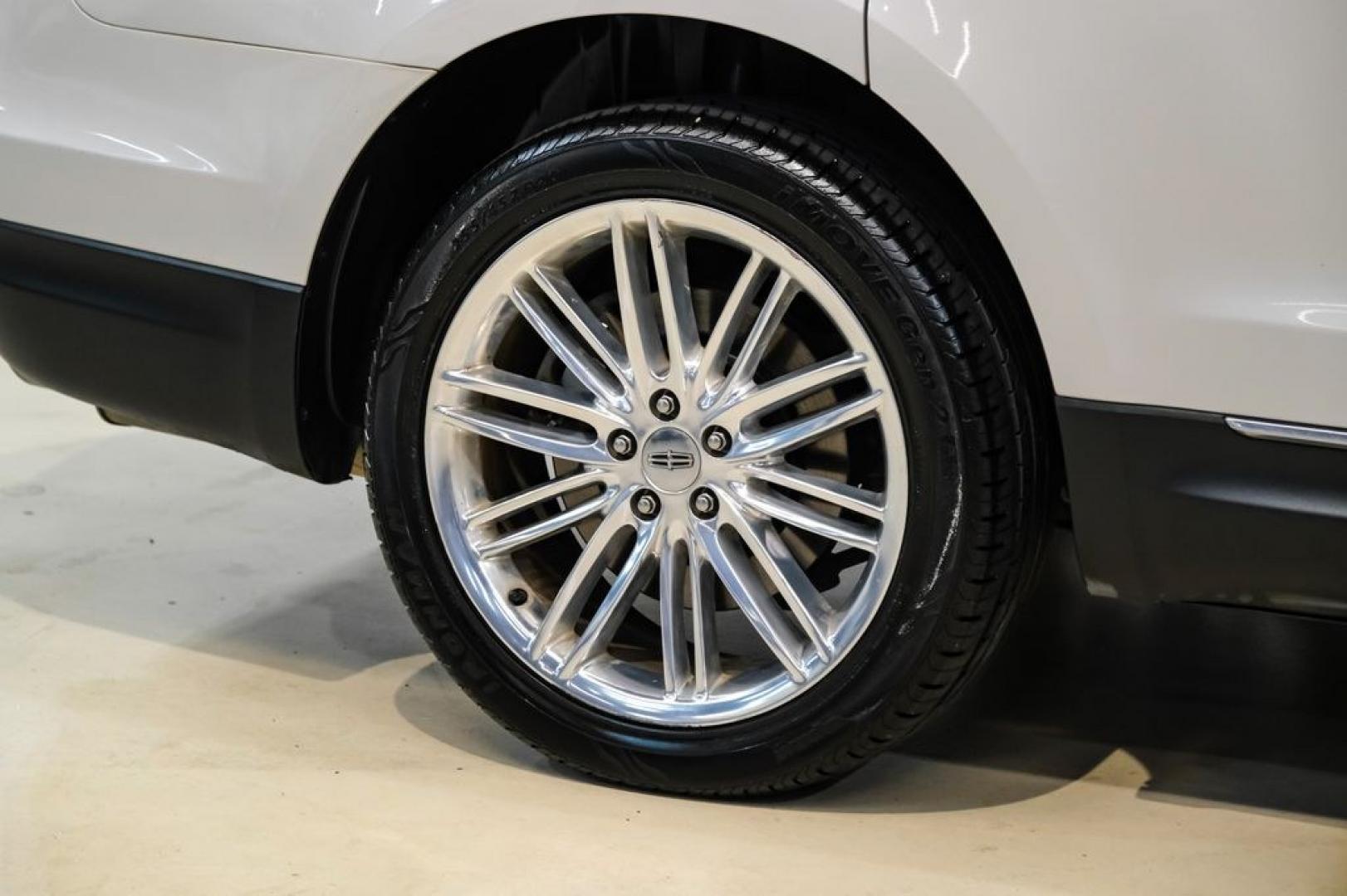 2019 Pearl Metallic /Light Dune Lincoln MKT Standard (2LMHJ5AT2KB) with an V6 engine, Automatic transmission, located at 15300 Midway Rd., Addison, TX, 75001, (972) 702-0011, 32.958321, -96.838074- Photo#56