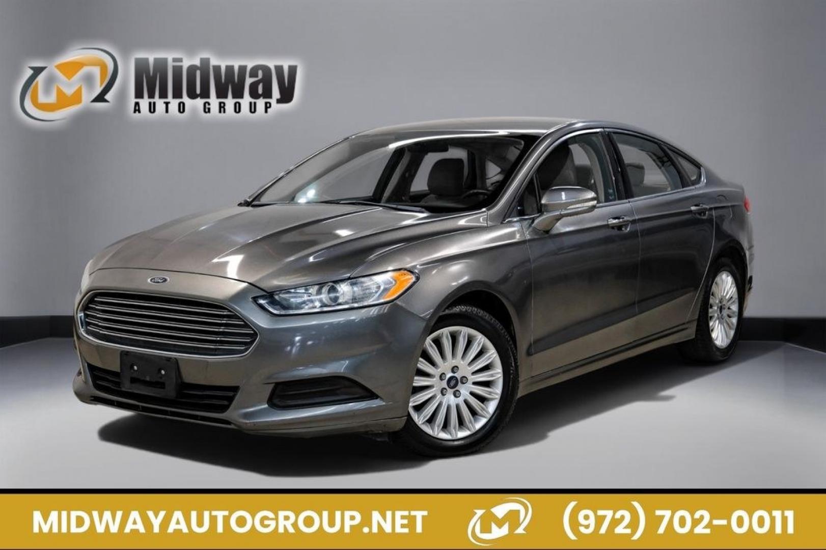 2014 Sterling Gray Metallic /Dune Ford Fusion Hybrid SE (3FA6P0LU0ER) with an 2.0L I4 Atkinson-Cycle Hybrid engine, CVT transmission, located at 15300 Midway Rd., Addison, TX, 75001, (972) 702-0011, 32.958321, -96.838074- Photo#0