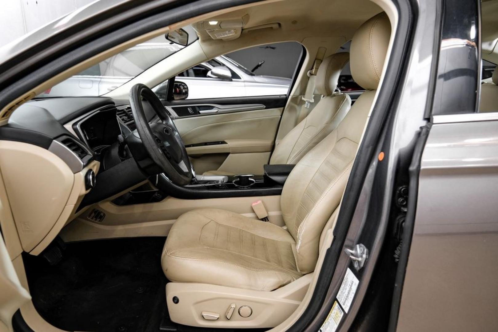 2014 Sterling Gray Metallic /Dune Ford Fusion Hybrid SE (3FA6P0LU0ER) with an 2.0L I4 Atkinson-Cycle Hybrid engine, CVT transmission, located at 15300 Midway Rd., Addison, TX, 75001, (972) 702-0011, 32.958321, -96.838074- Photo#3