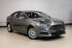 2014 Sterling Gray Metallic /Dune Ford Fusion Hybrid SE (3FA6P0LU0ER) with an 2.0L I4 Atkinson-Cycle Hybrid engine, CVT transmission, located at 15300 Midway Rd., Addison, TX, 75001, (972) 702-0011, 32.958321, -96.838074- Photo#5