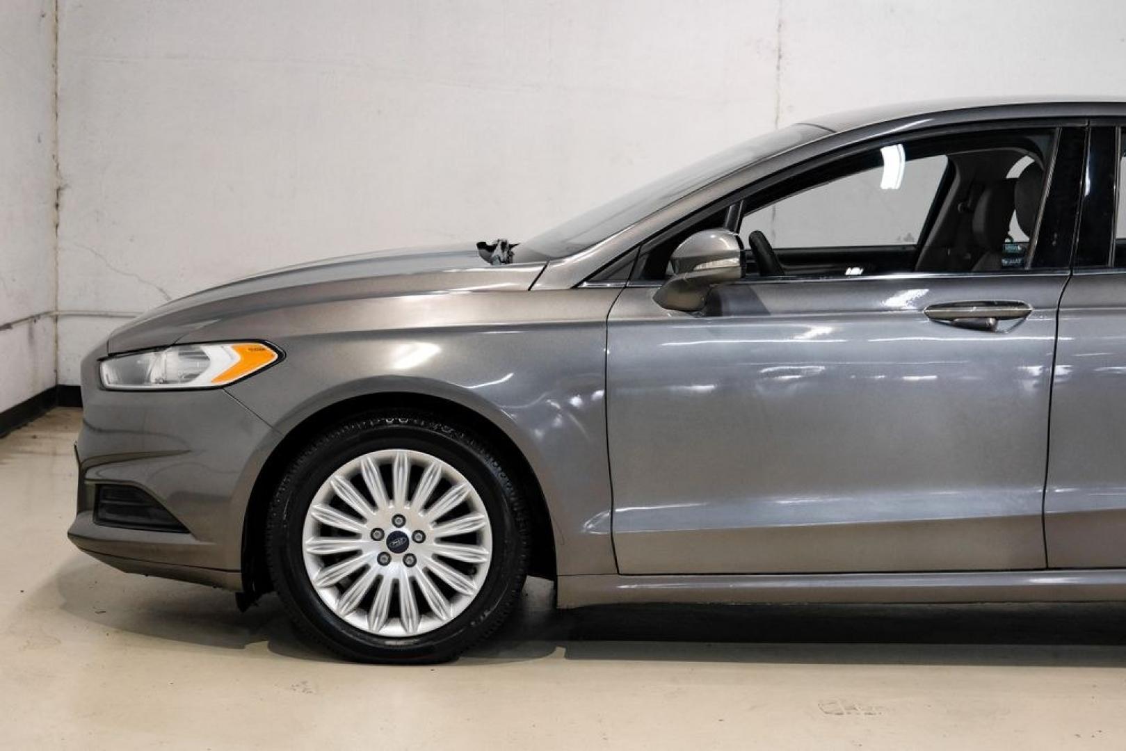 2014 Sterling Gray Metallic /Dune Ford Fusion Hybrid SE (3FA6P0LU0ER) with an 2.0L I4 Atkinson-Cycle Hybrid engine, CVT transmission, located at 15300 Midway Rd., Addison, TX, 75001, (972) 702-0011, 32.958321, -96.838074- Photo#13