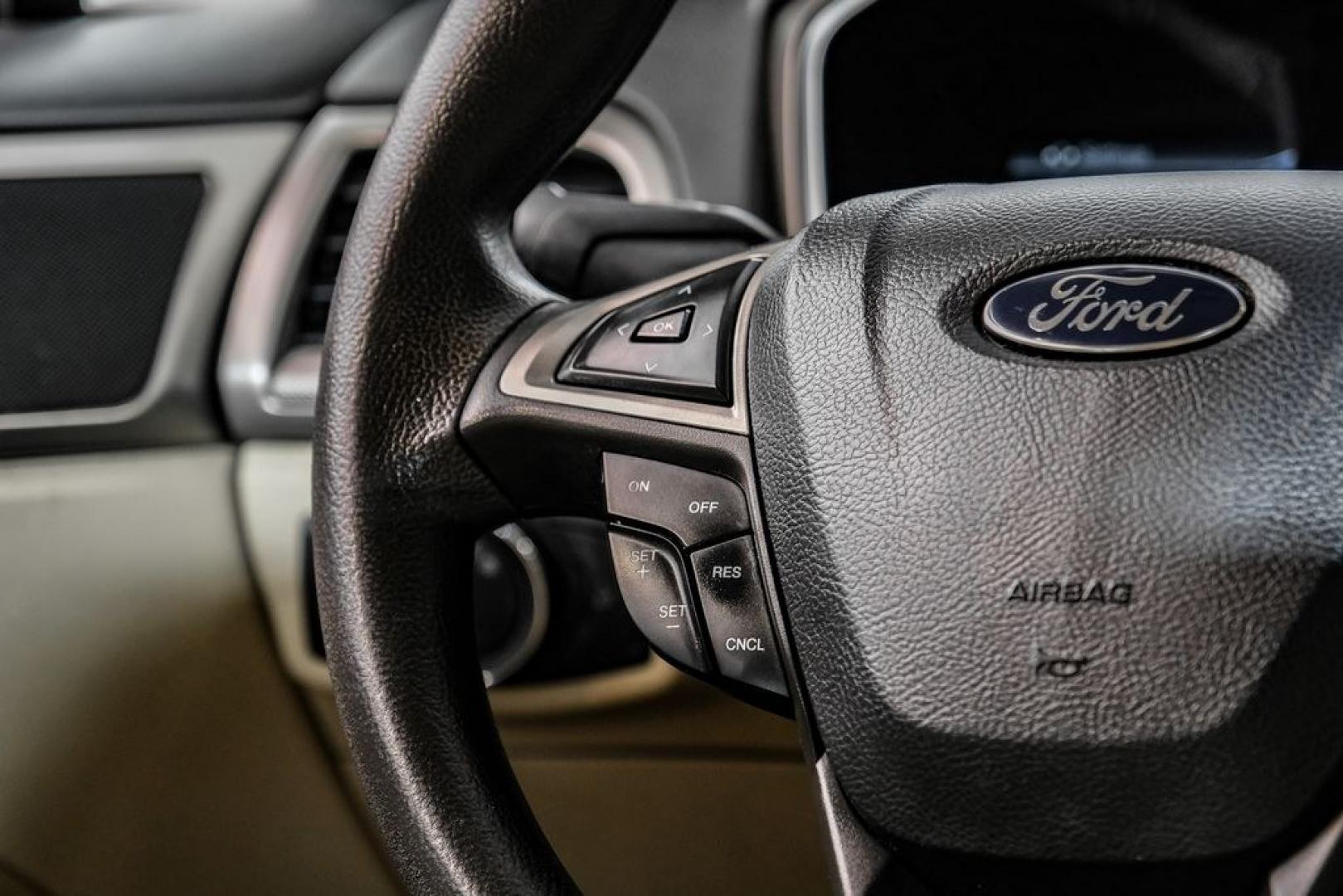 2014 Sterling Gray Metallic /Dune Ford Fusion Hybrid SE (3FA6P0LU0ER) with an 2.0L I4 Atkinson-Cycle Hybrid engine, CVT transmission, located at 15300 Midway Rd., Addison, TX, 75001, (972) 702-0011, 32.958321, -96.838074- Photo#20